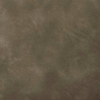 Textured surface in warm gray-brown, displaying a mottled, granular quality with diffused lighting and a subtly uneven, vintage-style finish.